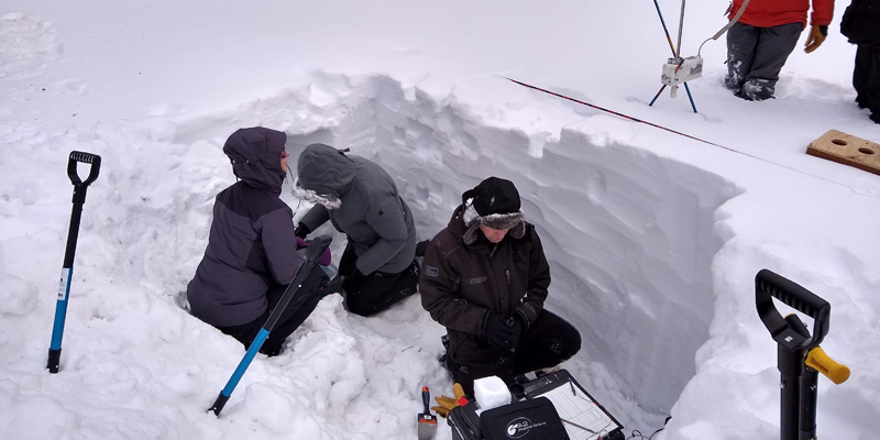 Researchers in the Snow